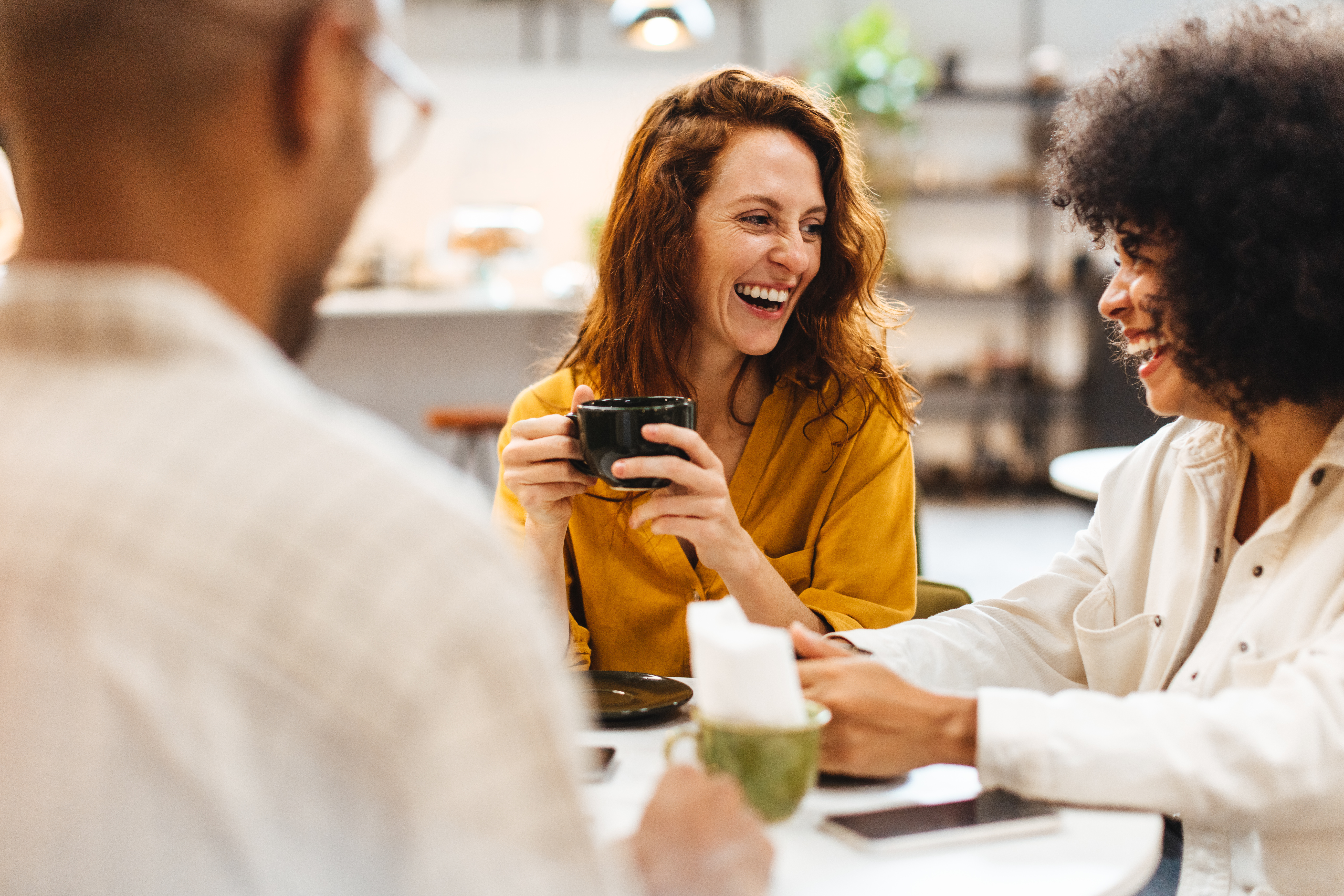 three people laughing